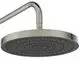 Duschkopf von Ideal Standard mit runder, flacher Oberfläche und strukturierten Auslassöffnungen für Wasser. Verbindungsarm in glattem Metall.